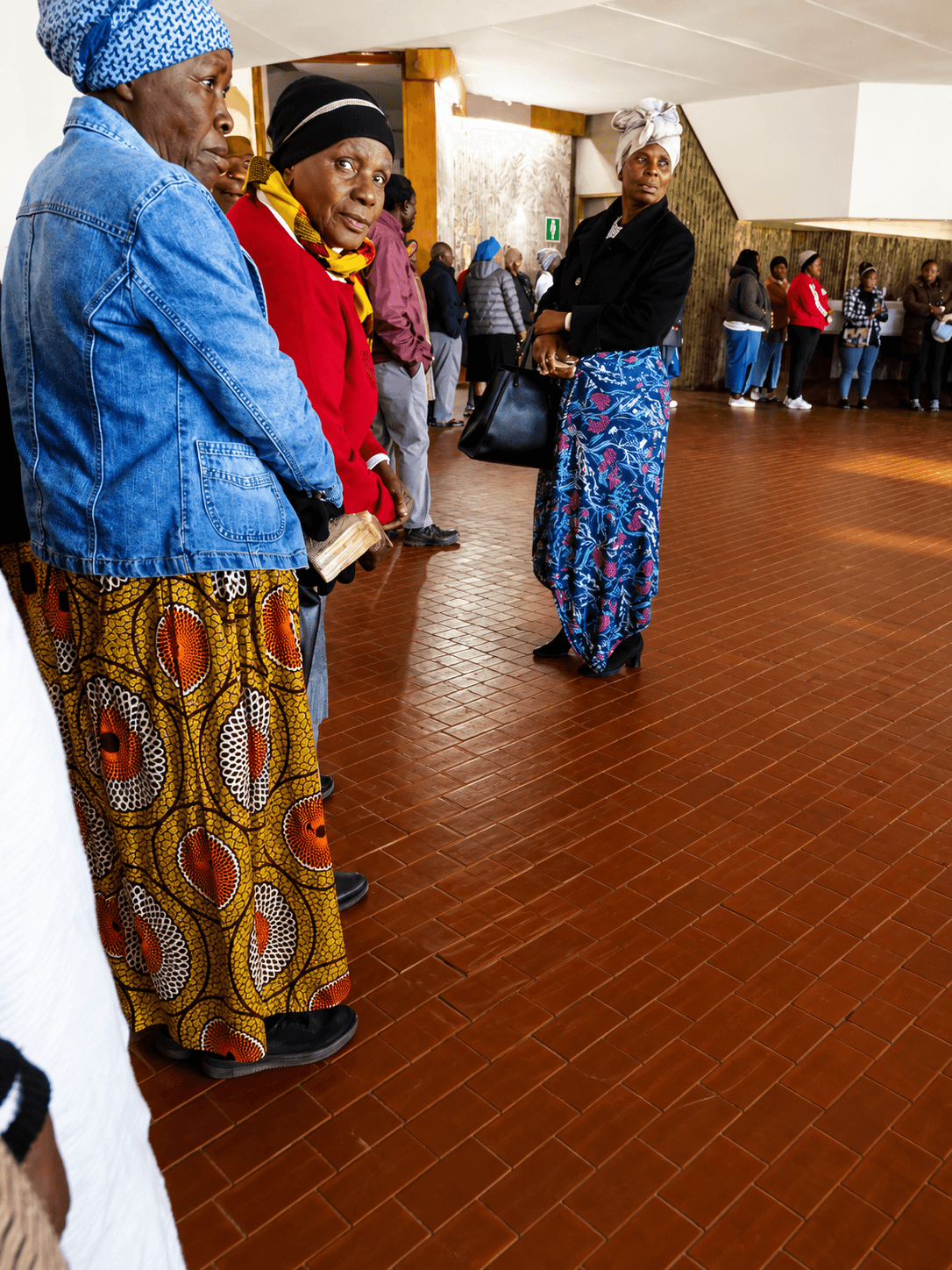 Club members gathering together in the community hall